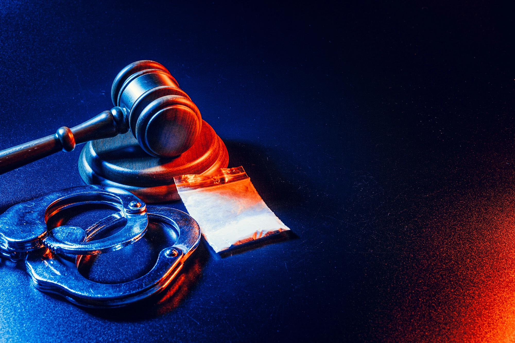 Gavel and drugs depicting drug crime