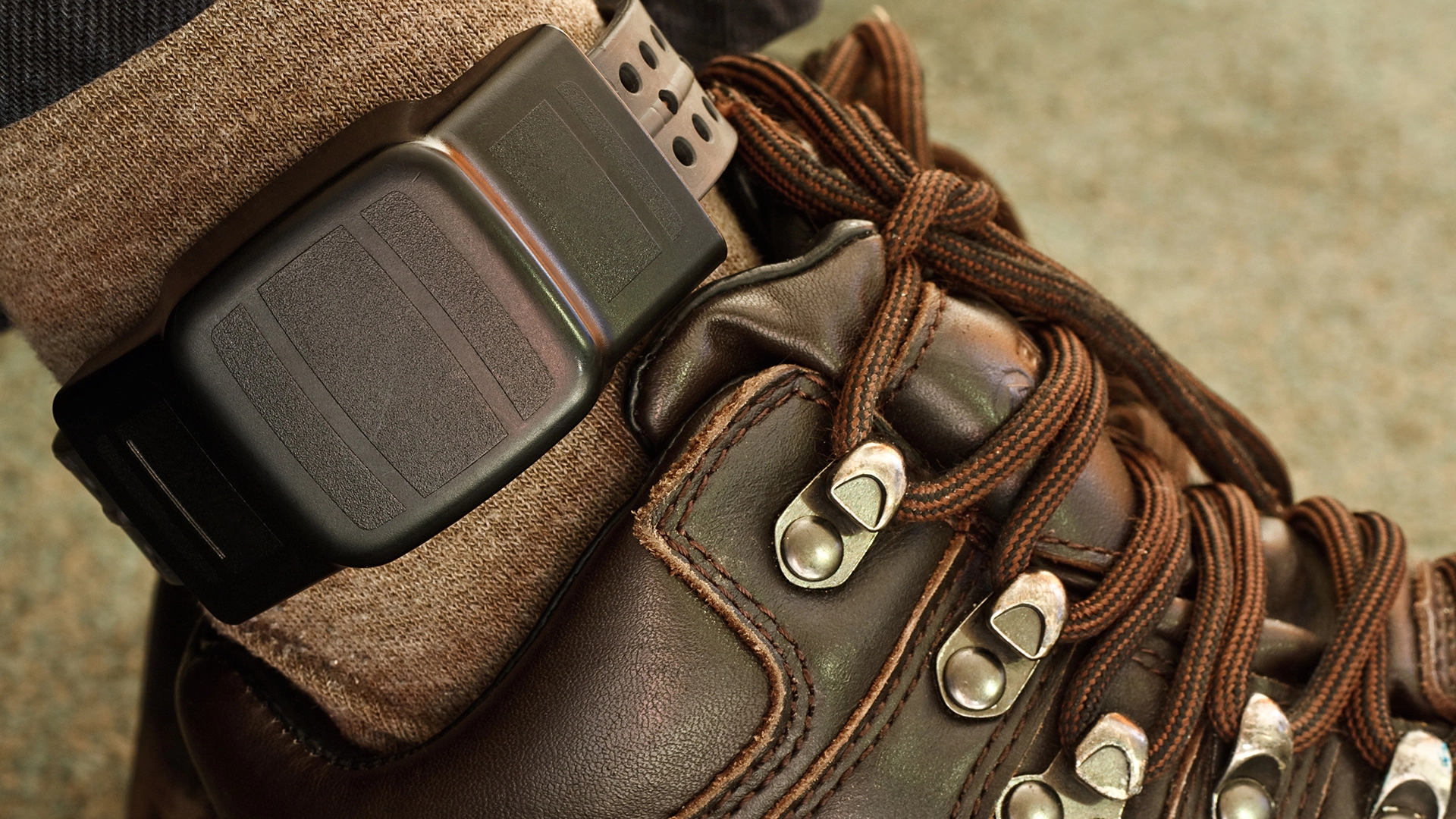 An ankle monitor on a person's foot representing a house arrest or other form of probation